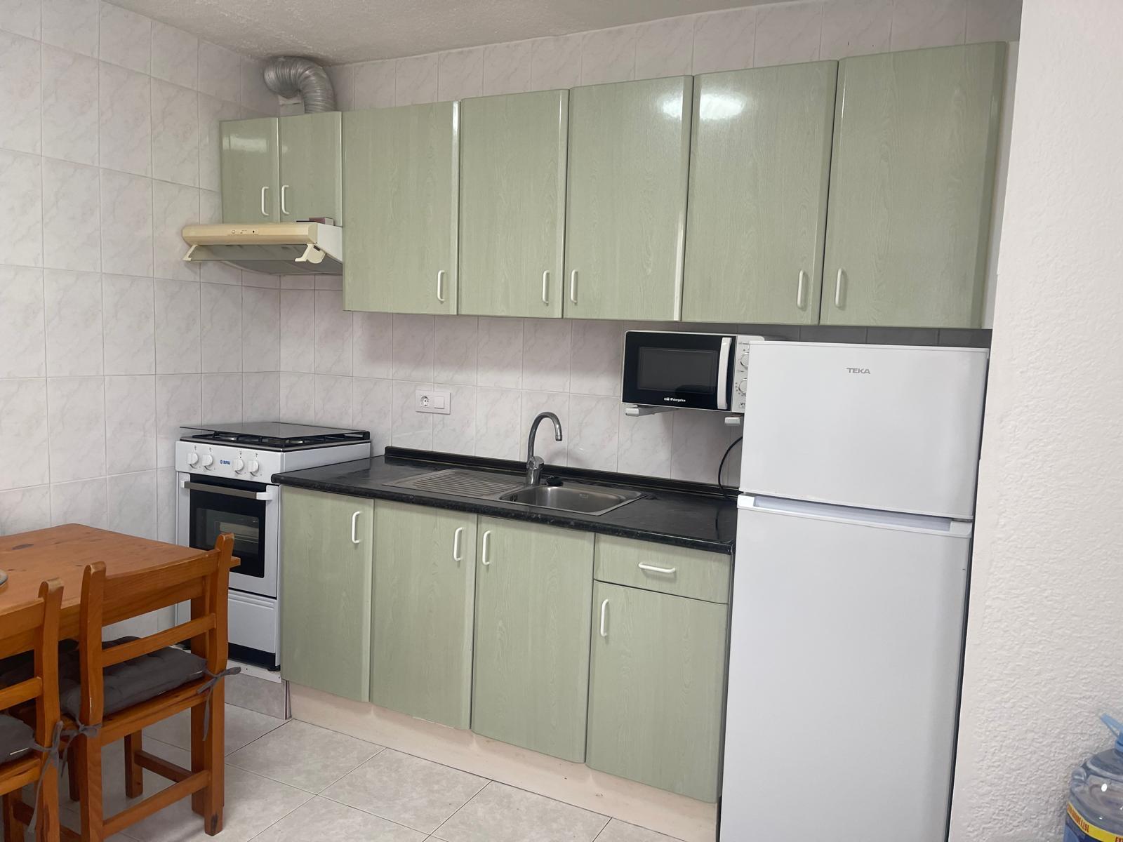 Alojamiento Delfimar Sur – cocina equipada